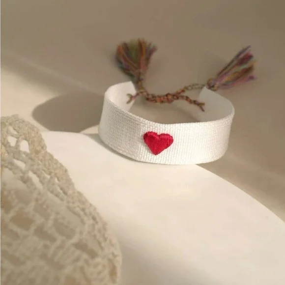 White Woven Embroidered Tassel Bracelet with Red Heart Accent - Picture 7 of 8